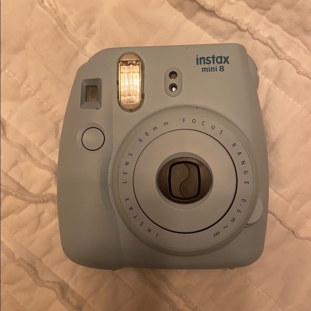 Cute blue polaroid camera